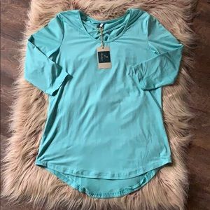 NWT- Turquoise boutique criss cross top